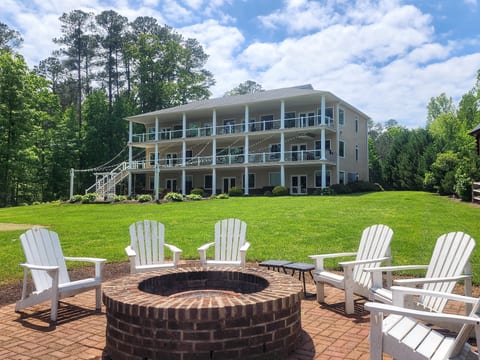 Our waterfront home. Large gently sloping grass backyard on the water.