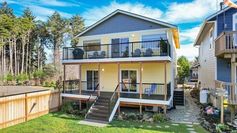 Two large decks with peeakaboo views of the beach.