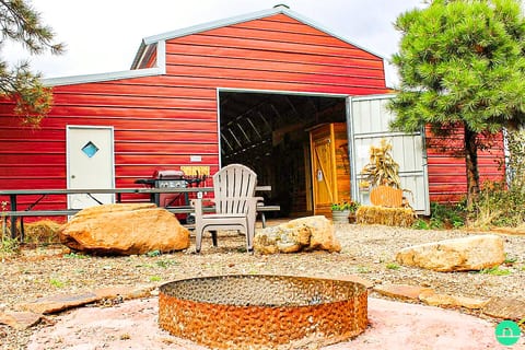 Barndominium with roll up garage door.