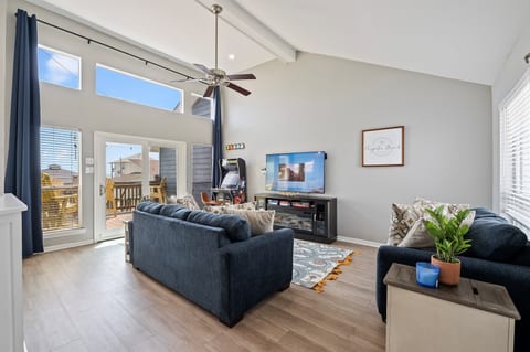 The Hero: Designer-curated living space with a serene, upscale West End vibe.