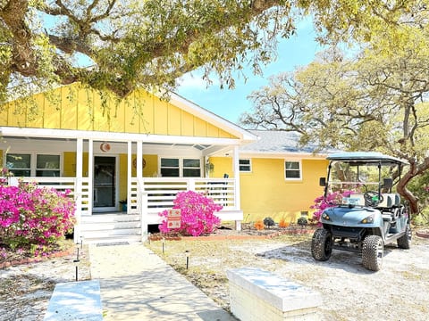 Sunny Daze Main Entrance and 6-Seater Golf Cart