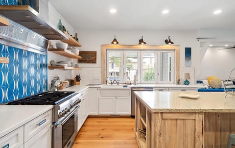 Thermodor Gas Range.  Windows to Private Side Screened Porch.