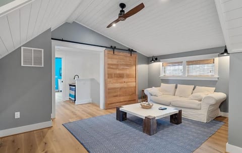 "Penthouse" Living room on 3rd Floor.  TV, Sonos and Double Bed in this area.