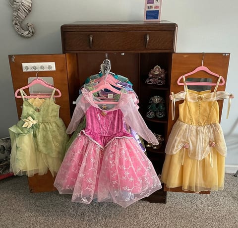 Disney Princess armoire for inside play only. So many Disney Park gowns, slippers, jewelry and tiaras. Sizes from 12 months to 8 years.
