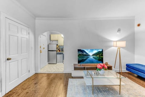 Kitchen detail with coffee maker, dishware, and all the essentials — start your morning right before crossing the bridge to Manhattan.