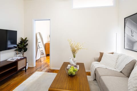Modern living room with cozy, minimalist charm.