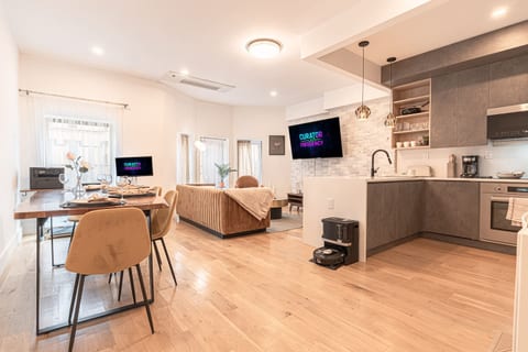 Stylish, fully renovated 2BR with open-concept living, dining and kitchen on warm hardwood floors — your spacious Brooklyn home base.