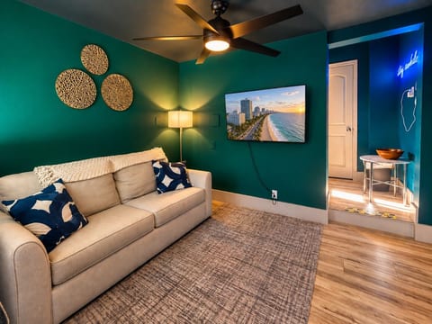Cozy Teal Living Room with Beach View