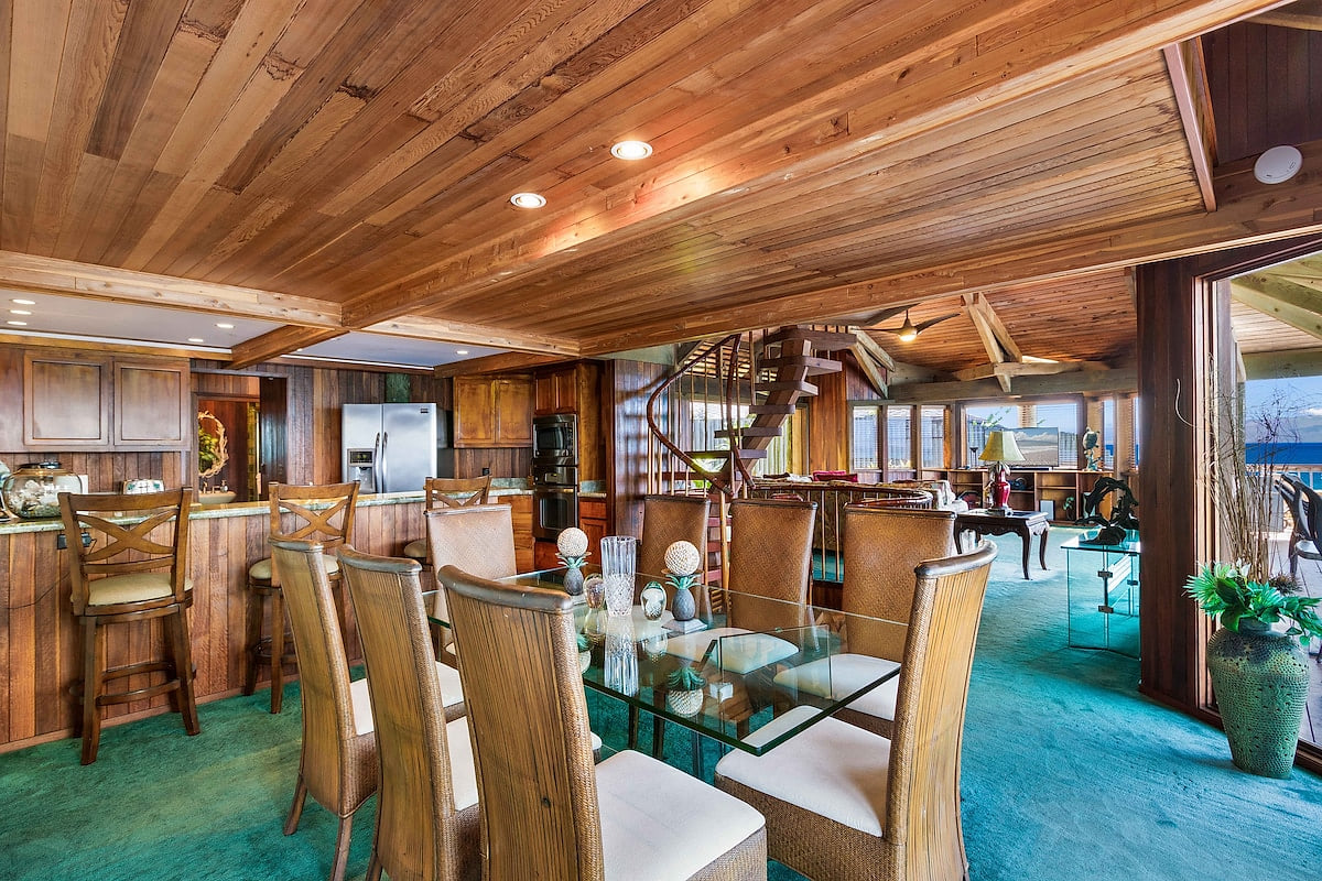 Dining for 8 at the table, with 3 more at the bar and another full size dining table on the exterior lanai as well as several other seating areas perfect for enjoying food/drink as well.