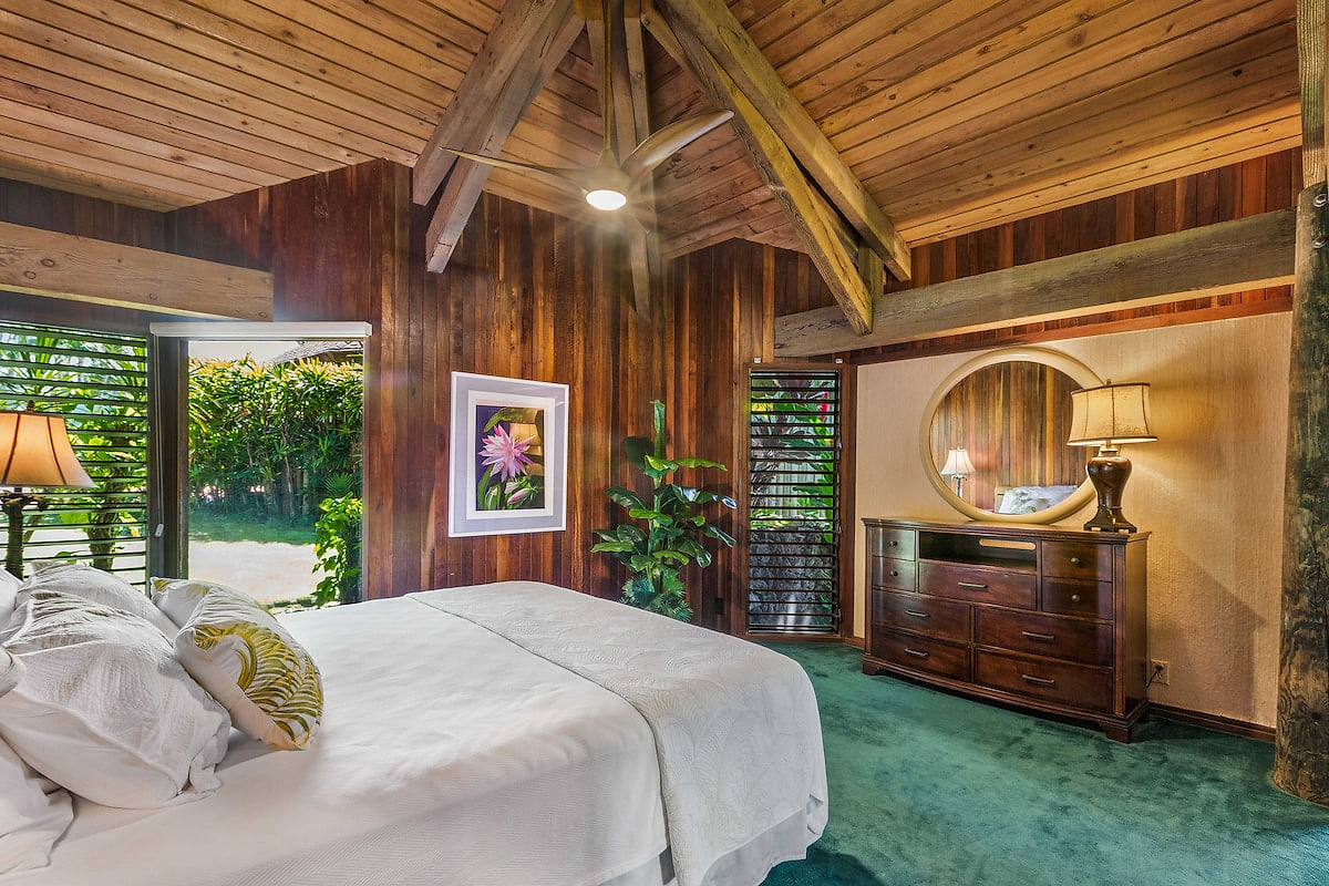 The upstairs bedroom 3 has a view of the garden are entry and is well ventilated with windows on 3 sides.