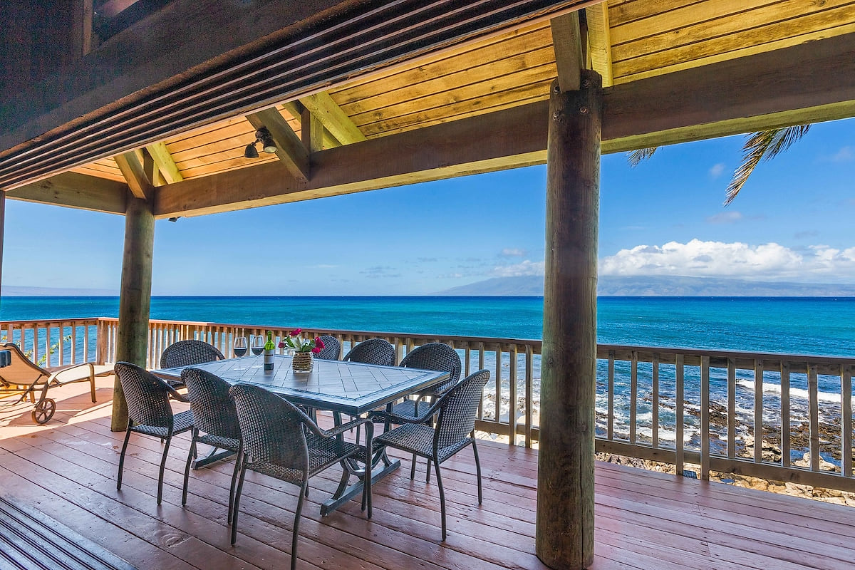 Looking straight out towards Molokai from the living area with the incredible outdoor dining experience in the foreground.