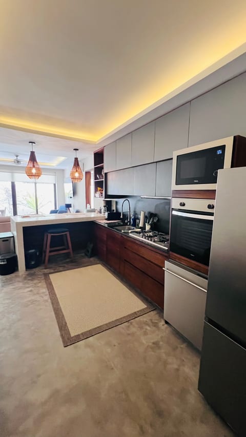 The fully stocked gourmet kitchen has everything you need to prepare anything from a quick breakfast to a family feast.