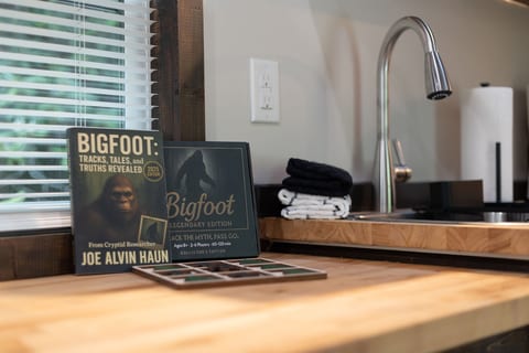 Bigfoot-themed touches throughout the bungalow make this tiny home stay extra fun and memorable.
