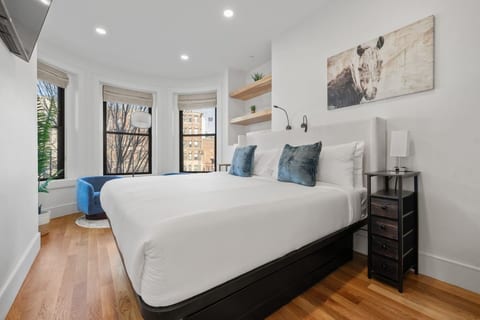 Cozy King Bedroom with City View