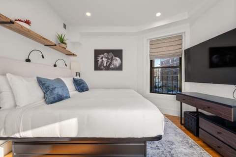 Cozy King Bedroom with TV