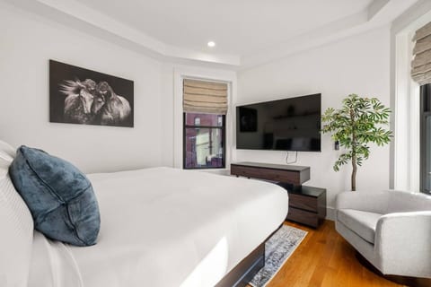 Cozy King Bedroom with TV