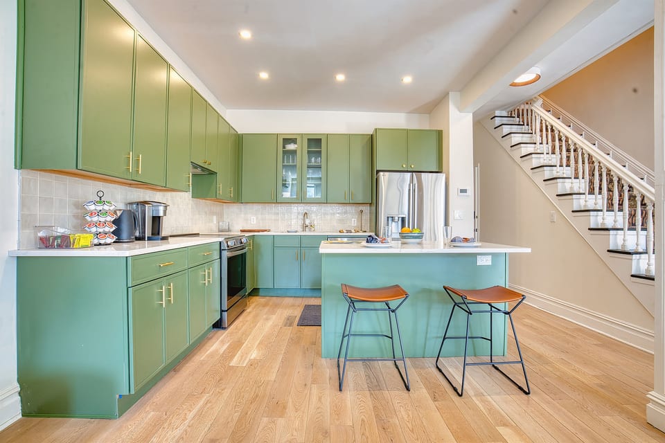 Spacious kitchen with all the comforts of home, fully stocked with pans, glassware, spices, coffee station, as well as additional amenities. 