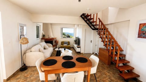 Bright Living Room with Sea and Mountain Views