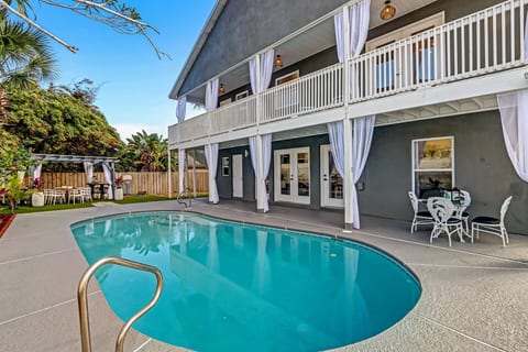 Unwind in your private heated pool, surrounded by a peaceful backyard designed for pure relaxation. Whether it’s a sunny afternoon or an evening swim, this is your personal coastal escape.