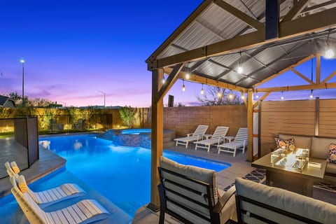 Enjoy Lounging on the in-pool loungers or on the sofas next to the firepit.  In the winter, enjoy snow-capped mountain views in the distance. -It's Showtime!