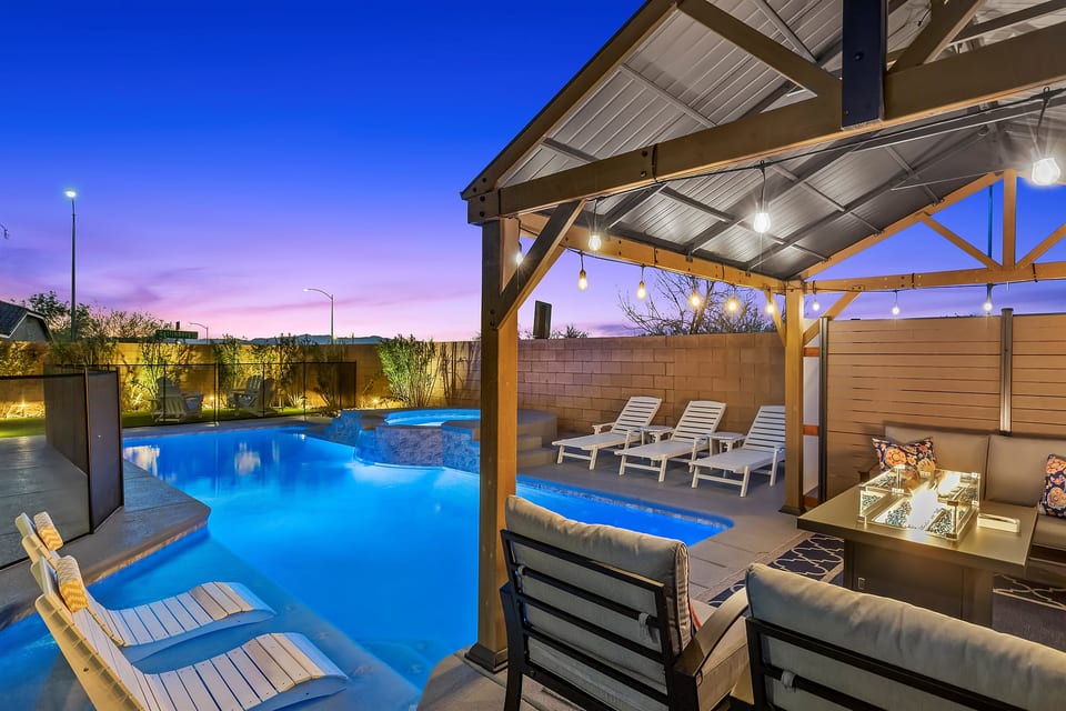 Enjoy Lounging on the in-pool loungers or on the sofas next to the firepit.  In the winter, enjoy snow-capped mountain views in the distance. -It's Showtime!