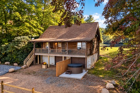 this photo has been edited by AI to show the privacy fence next to the hot tub that is in progress. The stairs are also being replaced.