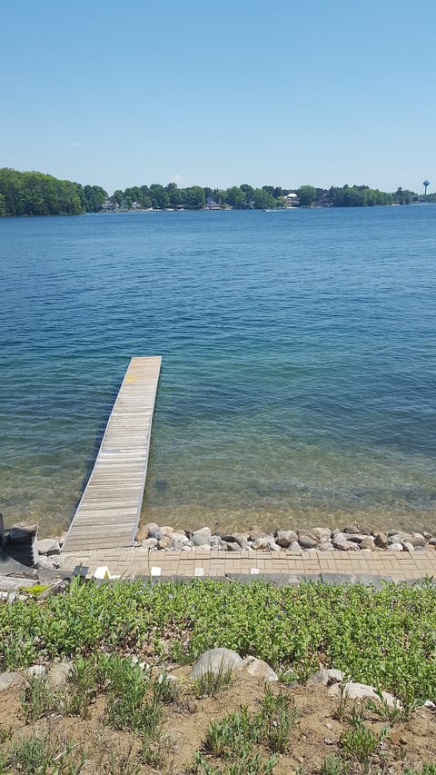 Silver Lake Cottage - private lakeside patio & dock with hard, sandy bottom swimming area