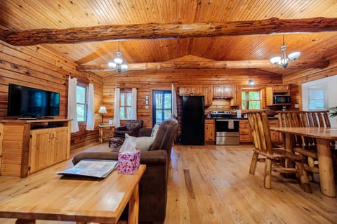 True log cabin with expansive log beams
