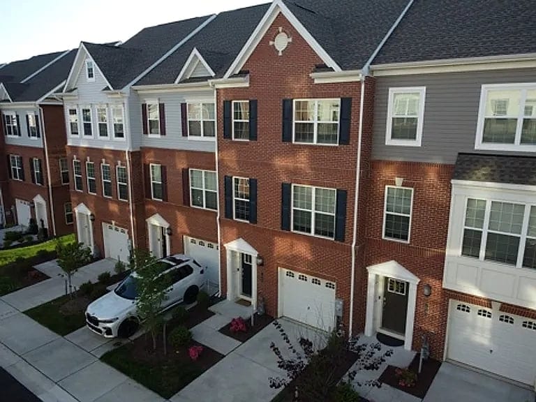 Stylish brick townhome with garage and great curb appeal