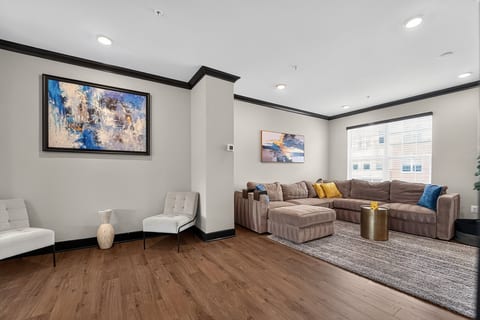Bright, spacious lounge with large sectional and stylish modern decor