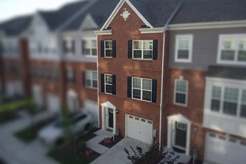 Stylish brick townhome with garage and great curb appeal