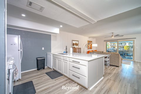 Open kitchen and living area designed for easy gathering, meals, and relaxed time between outings