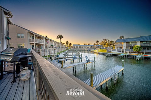 Relax on the waterfront deck and enjoy peaceful canal views, sunset skies, and easy vacation vibes