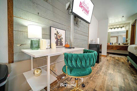 Thoughtfully styled interior with a chic workspace and welcoming touches that feel far more personal than a standard hotel room.