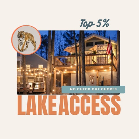 Top-rated lake access retreat with glowing decks and cozy evening ambiance