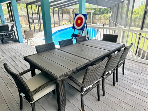Inviting Screened Porch with Smart TV
