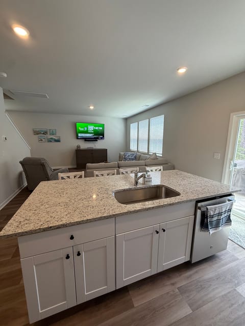 Coffee bar, microwave, toaster oven, rice maker, fridge, freezer, disposal, dishwasher, stove, oven, blackstone accessories