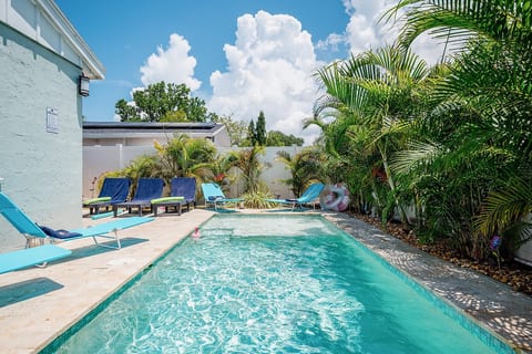 Private pool with tropical landscaping — 4-bedroom vacation rental in St. Petersburg, FL. Sleeps 10, fully fenced, minutes from St. Pete Beach.