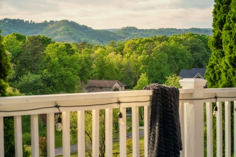 Private deck with string lights and sweeping mountain views