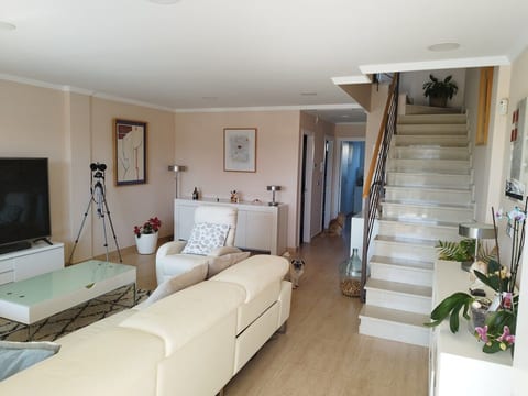 Living room and access to bedrooms on the first floor