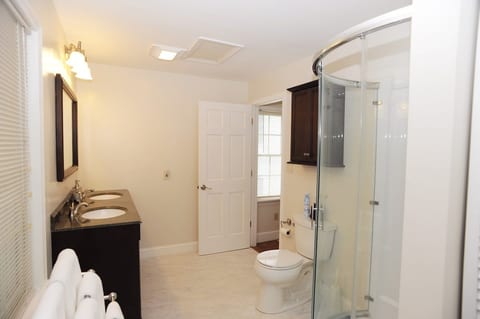 Bath with shower, double sink, washer & dryer