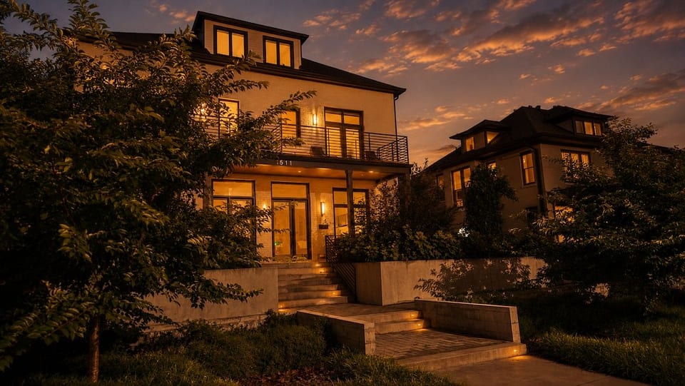 Music Row House at golden hour — modern 3-story home glowing against a Nashville sunset — your base for the whole trip