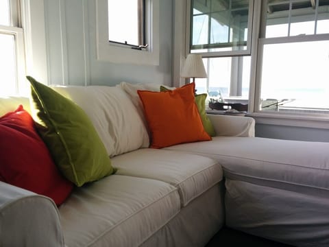 Comfortable cottage with bay views on a private beach.