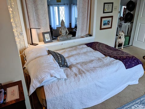 Looking from the bedroom into the sunroom/office area of the guest suite. (Photo bombed by Cyrus)