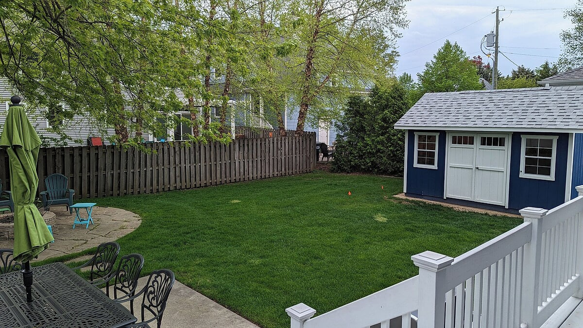 Open back yard for fun and games! Dining table for 8.