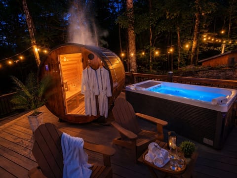 Sauna + Cold Plunge + Wellness Deck
Enjoy a spa-like experience with a cedar barrel sauna, cold plunge, Adirondack seating, robes, and ambient lighting surrounded by nature.
