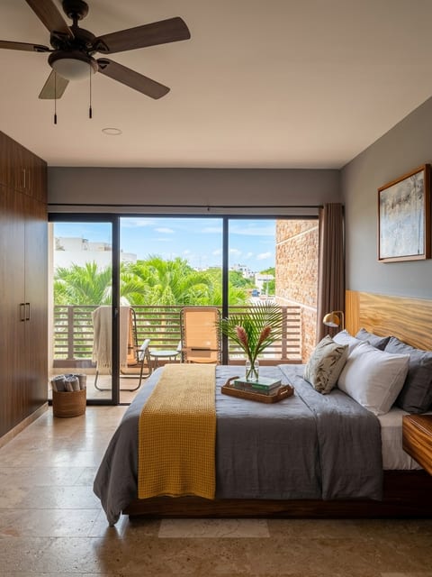 Rest and recharge. A comfortable setup with fresh linens and perfectly cool A/C for a great night's sleep after a productive day.