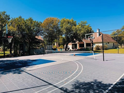 Private 'Sports Court' featuring a regulation pickball net & lines as well as college/NBA basketball lines, and commercial lights for night play!