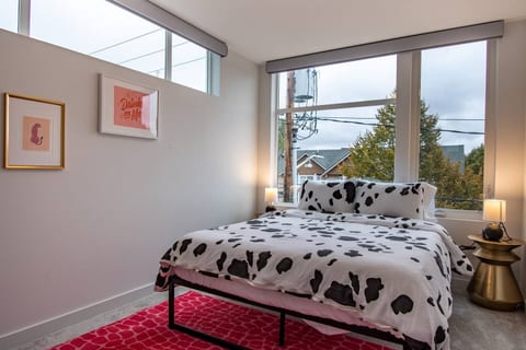 Master bedroom with comfortable queen bed. Attached master bath room with a large shower. Plenty of clothing storage in the bedroom closest to hang clothes.
