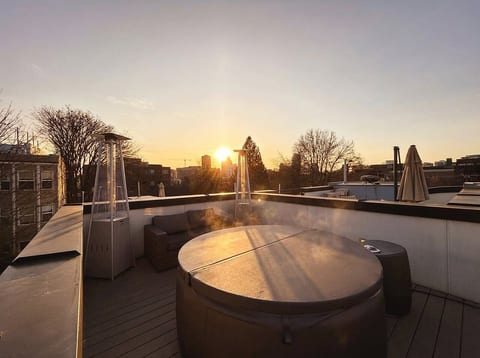 Rooftop oasis with hot tub, heaters & skyline sunset views